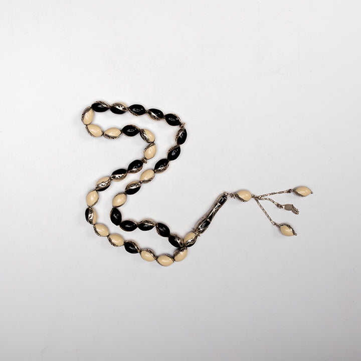 Ivory with Embroidered Silver Prayer Beads