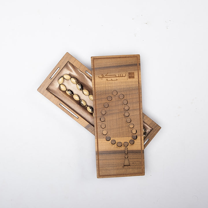 Ivory with Embroidered Silver Prayer Beads
